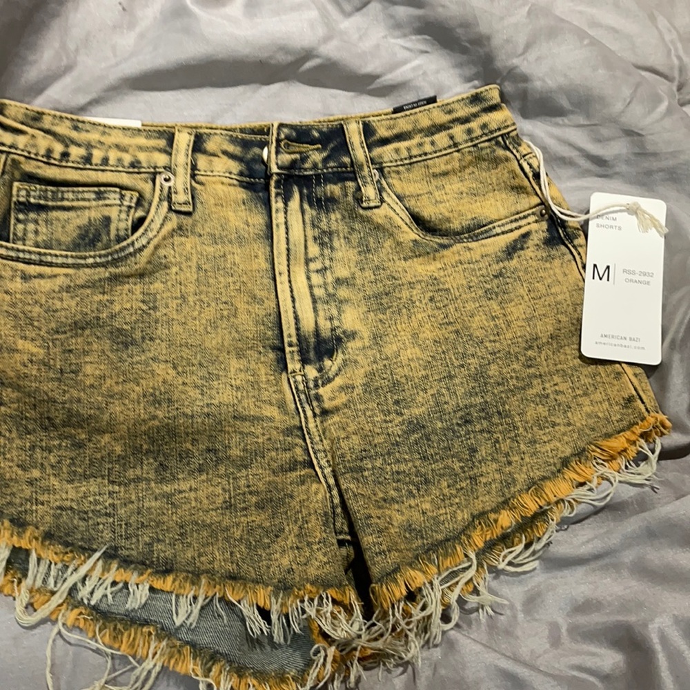 Acid wash shorts fringed edges
